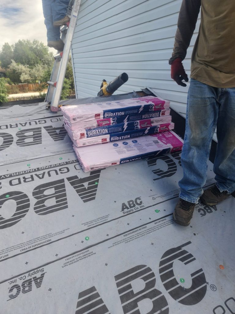 Class 4 impact-resistant shingle bundles staged on a Thornton rooftop