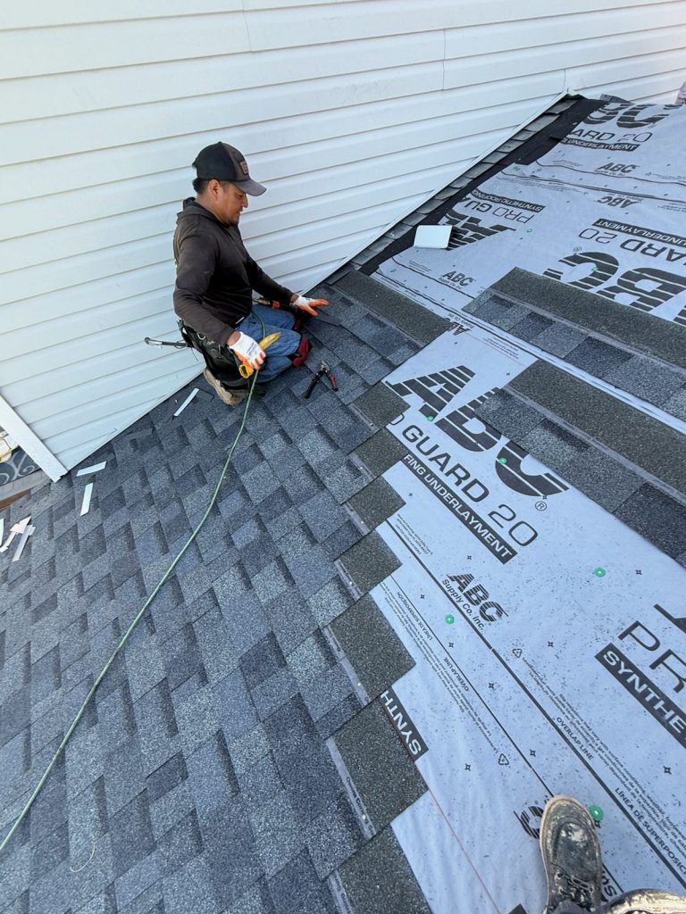 New roof over the garage and dormer on a Thornton hail replacement