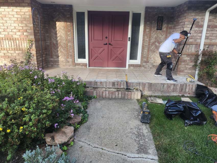 Before: original tile front porch during demolition on a Longmont, CO porch-to-Trex composite decking remodel